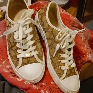 Woman's size 9.5 (39.5) Coach Shoes, colour tan,& brown with toes that are white